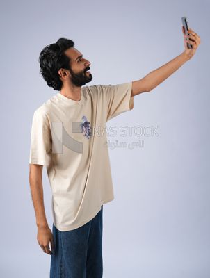Guy holding a mobile phone