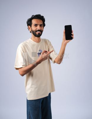 Guy holding a mobile phone