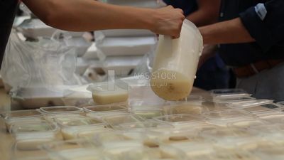 People prepare sweets to distribute for iftar,  Ramadan Kareem, preparing their iftar