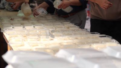 People prepare sweets to distribute for iftar,  Ramadan Kareem, preparing their iftar