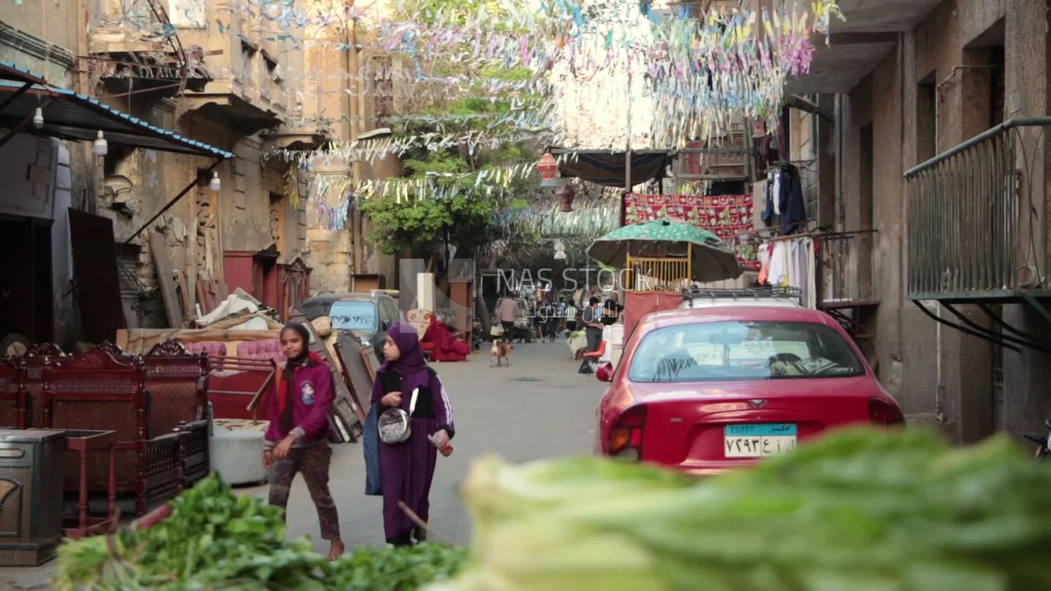 People walking in the street, Ramadan Kareem