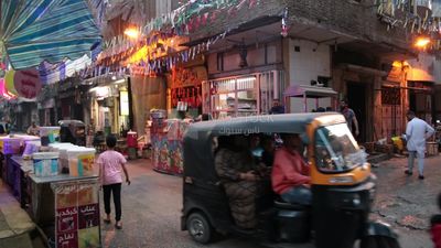 People walking in the street, Ramadan Kareem