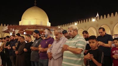 Worshipers praying in a mosque, performing the obligatory prayer in the mosque, worship and draw close to God