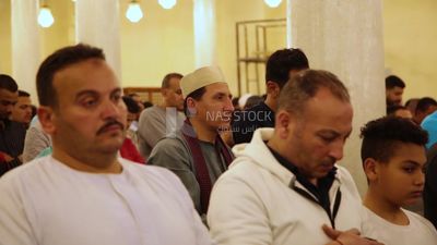 Worshipers praying in a mosque