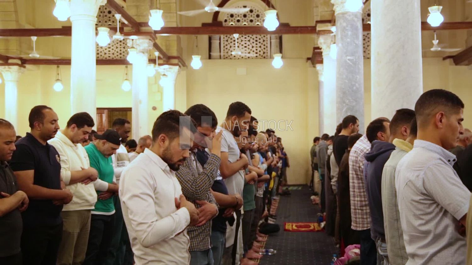 Worshipers praying in a mosque