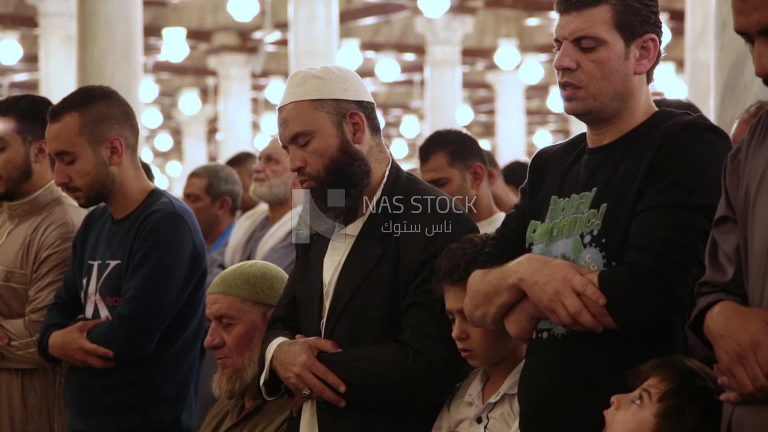 Worshipers praying in a mosque