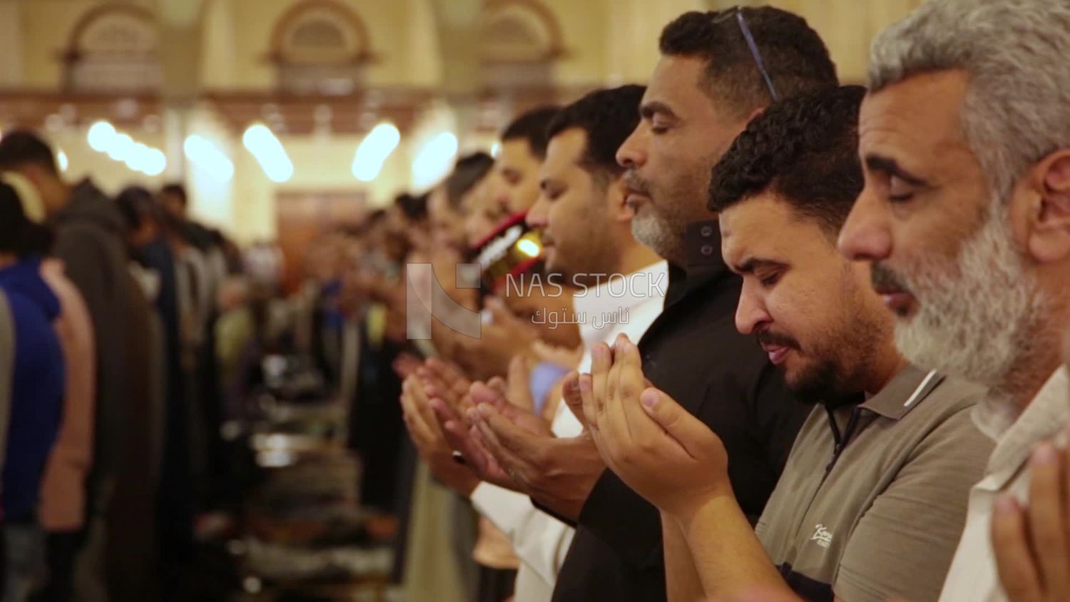 Worshipers praying in a mosque