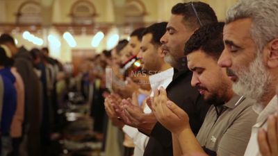 Worshipers praying in a mosque