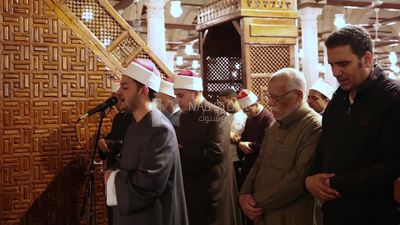 Worshipers praying in a mosque