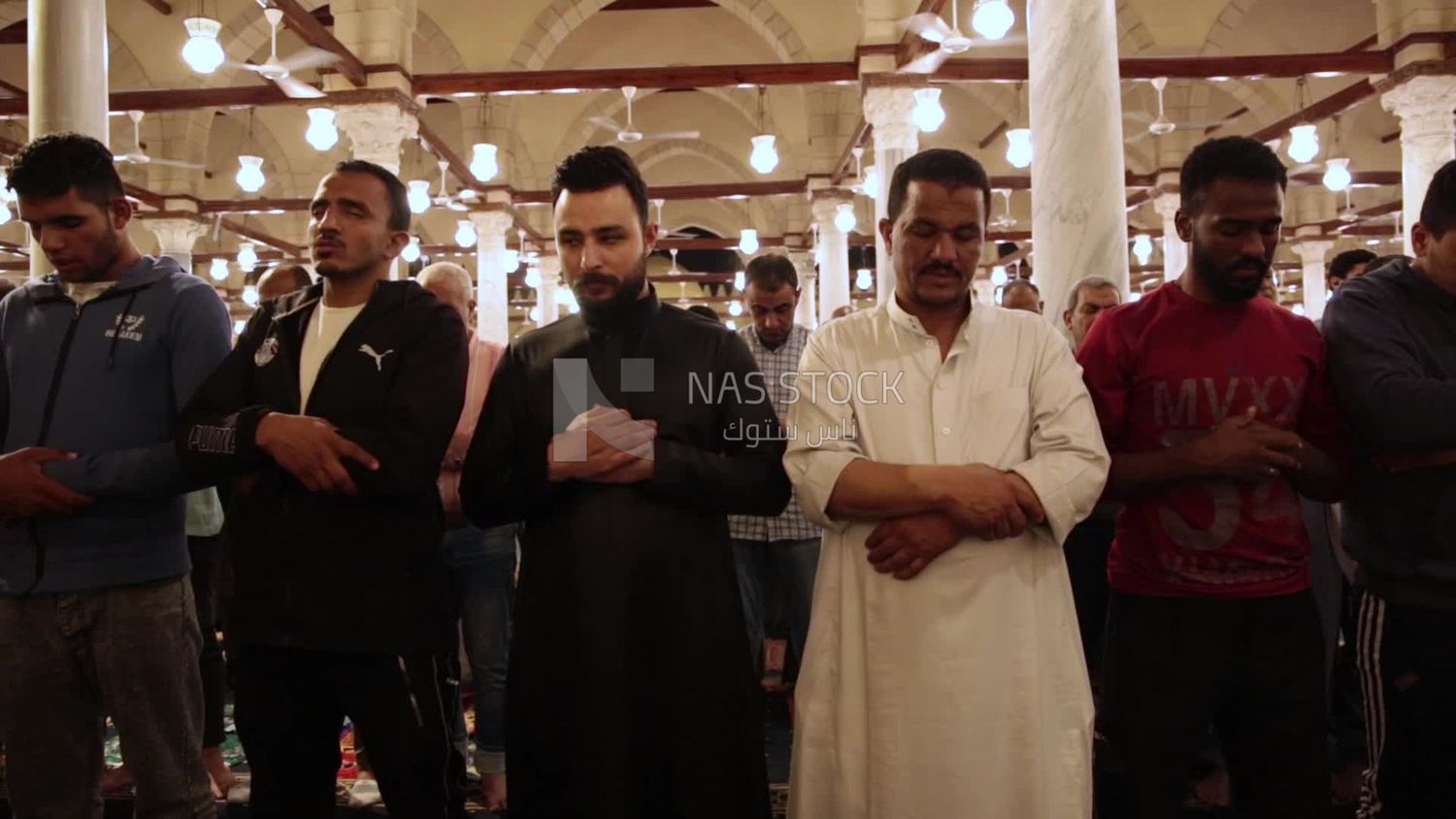 Worshipers praying in a mosque