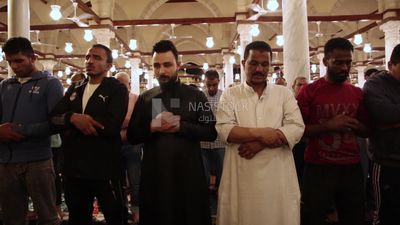Worshipers praying in a mosque