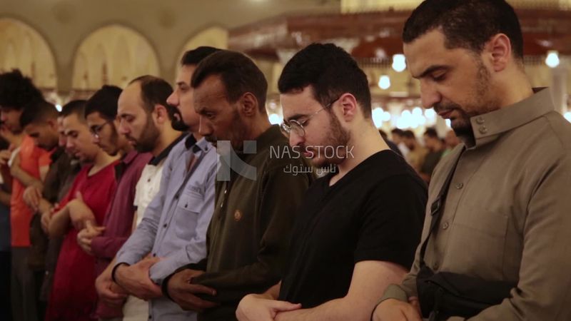 Worshipers praying in a mosque