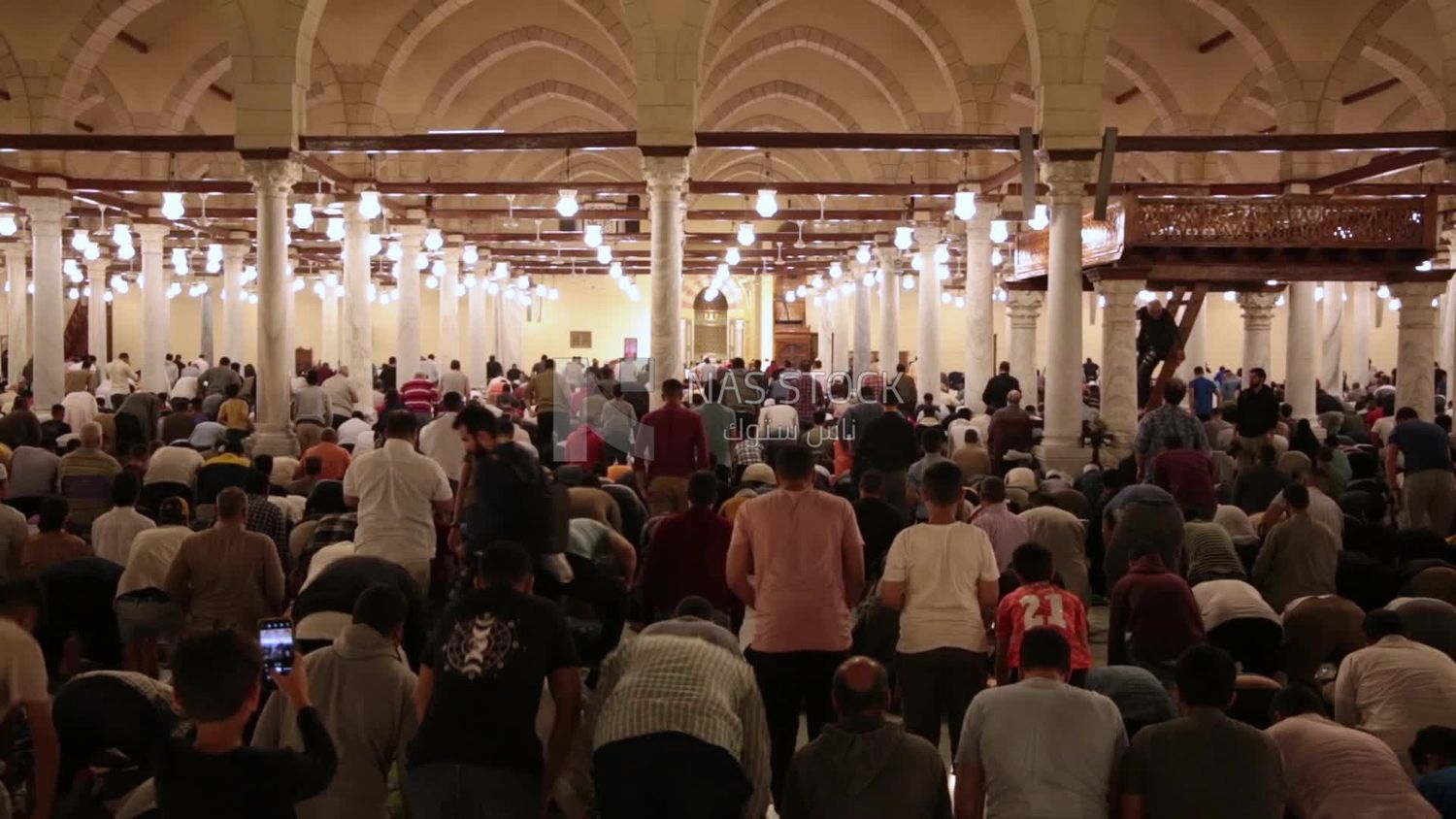 View from the back of the worshipers in the mosque