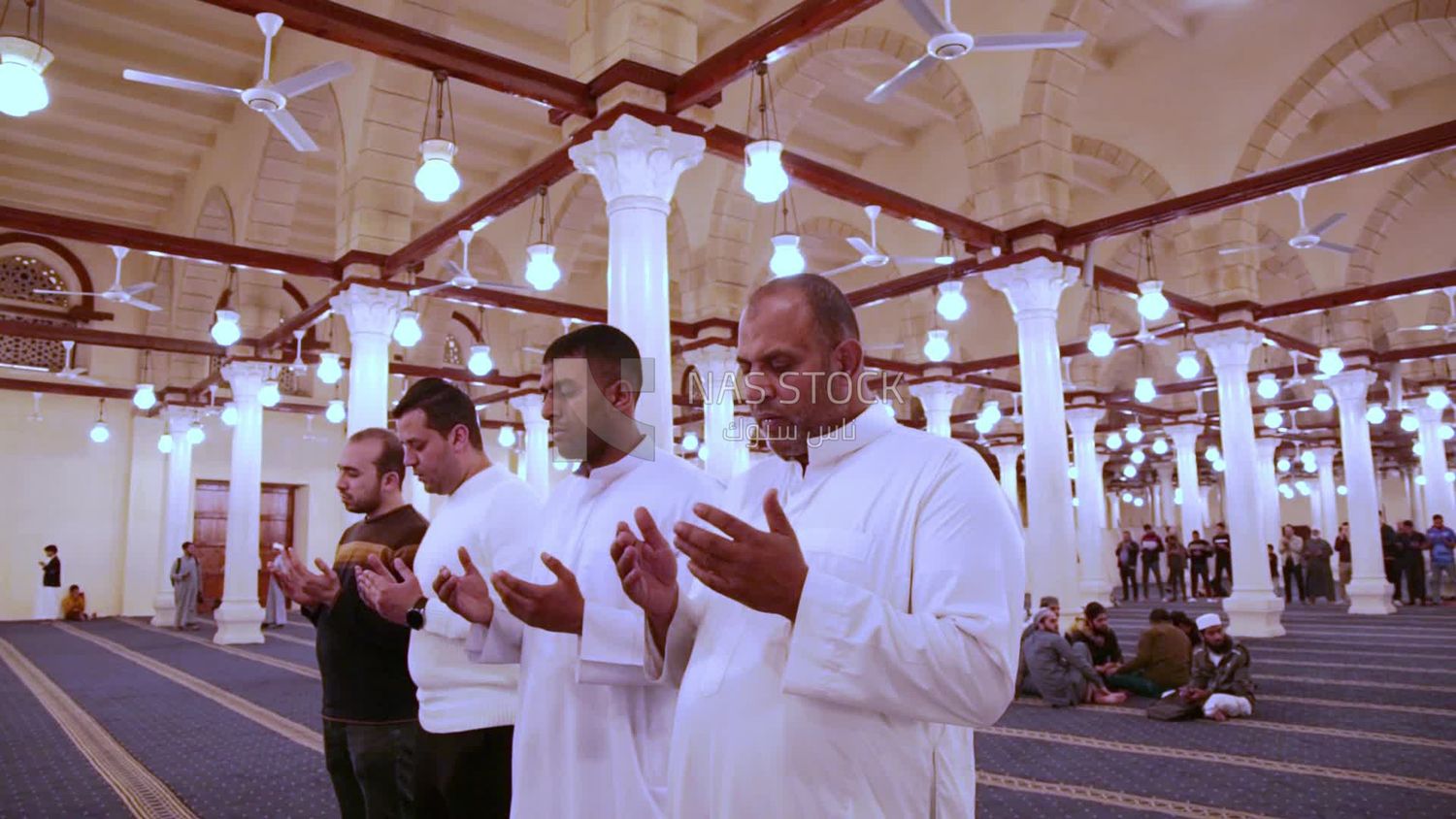 Worshipers praying in a mosque