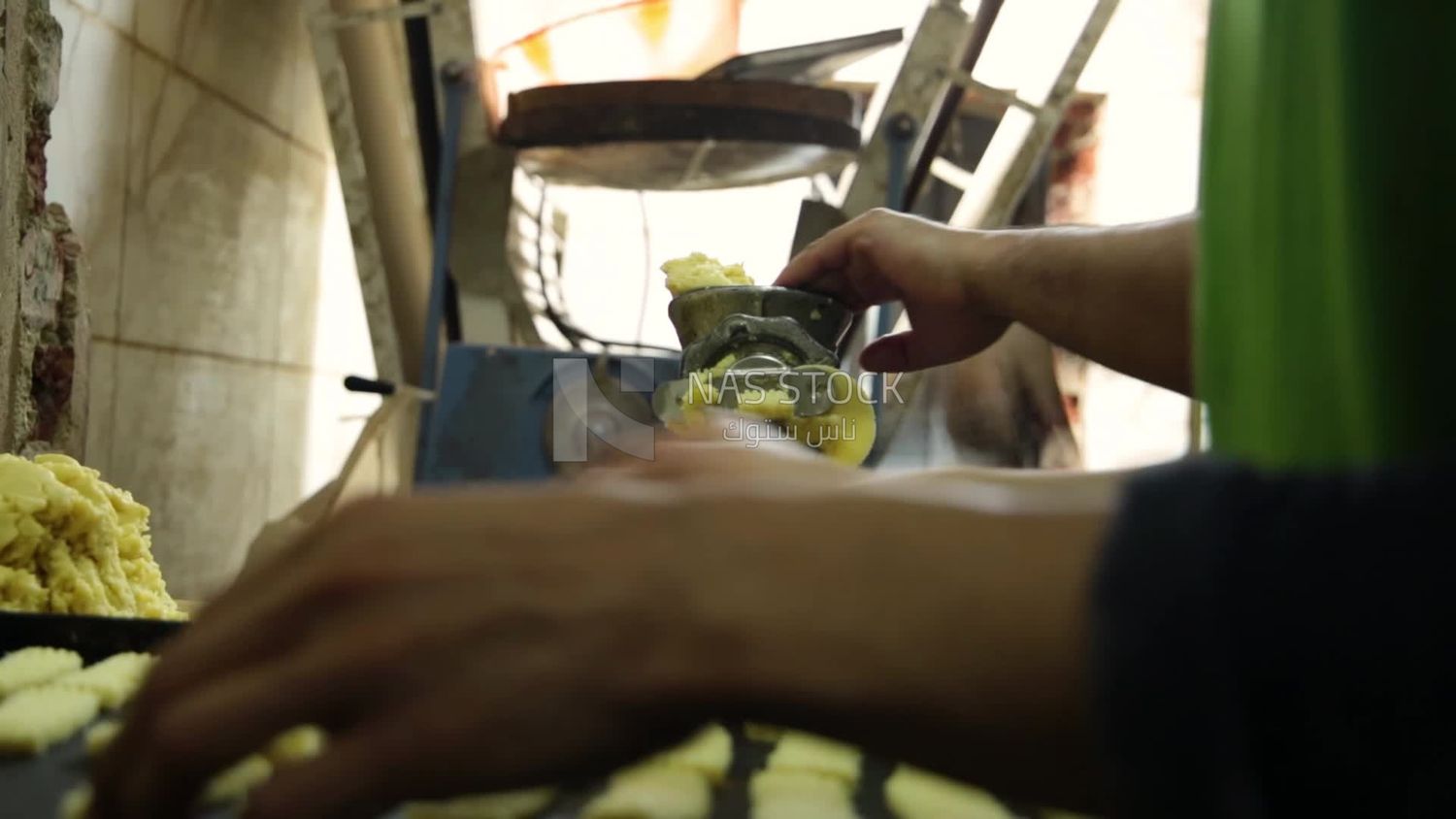 Two men making biscuits in a bakery, bakery store, Eid