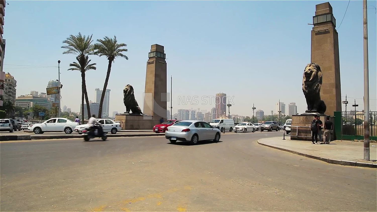 Group of cars driving on Qasr El Nil Bridge