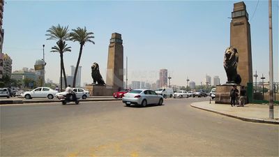 Group of cars driving on Qasr El Nil Bridge