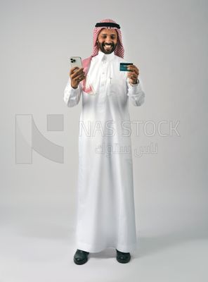 Gulf man holding phone and bank card