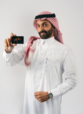 Gulf man holding a card