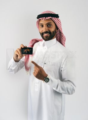 Gulf man holding a card