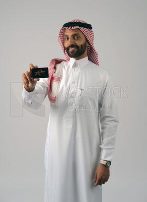 Gulf man holding a card