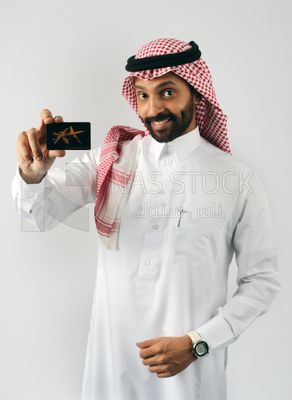 Gulf man holding a card