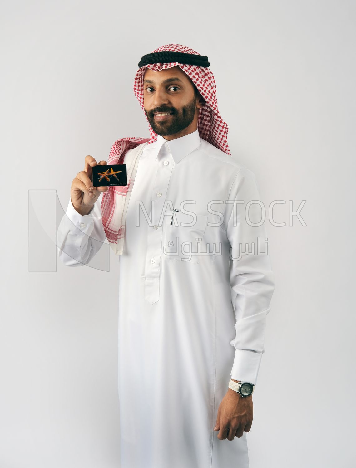 Gulf man holding a card