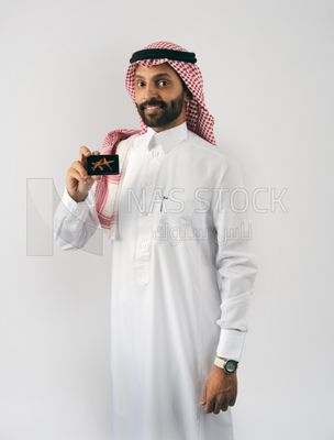 Gulf man holding a card