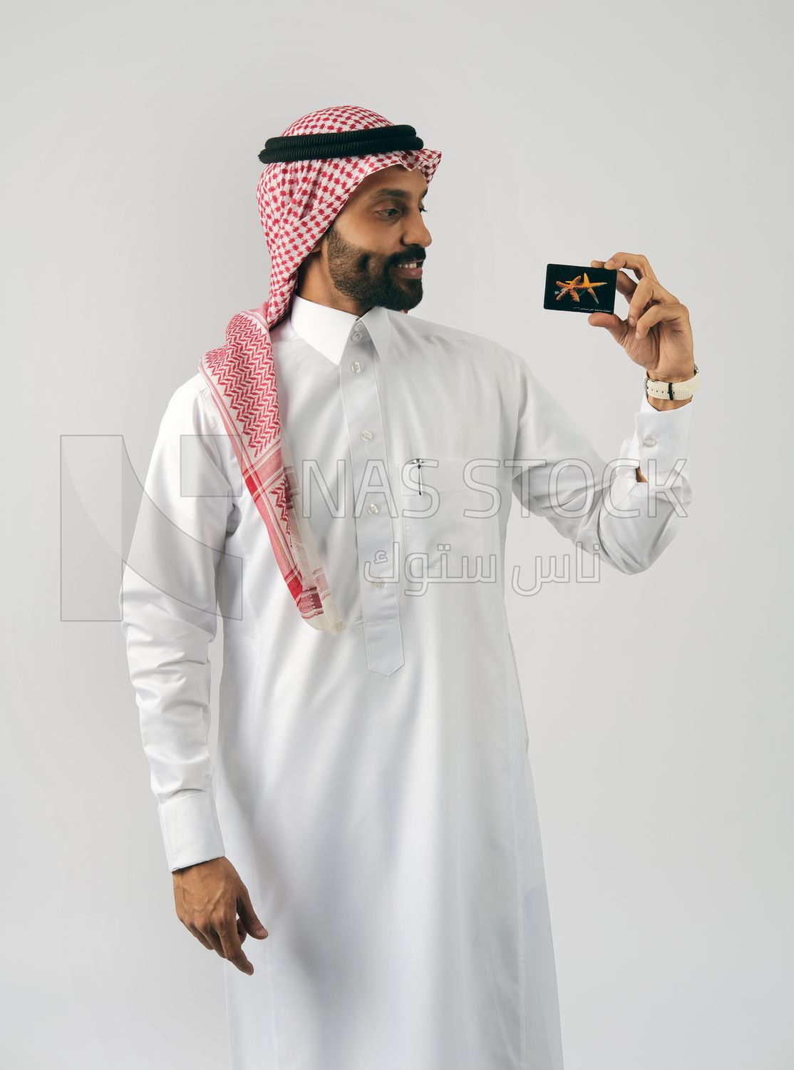 Gulf man holding a card