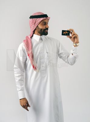 Gulf man holding a card