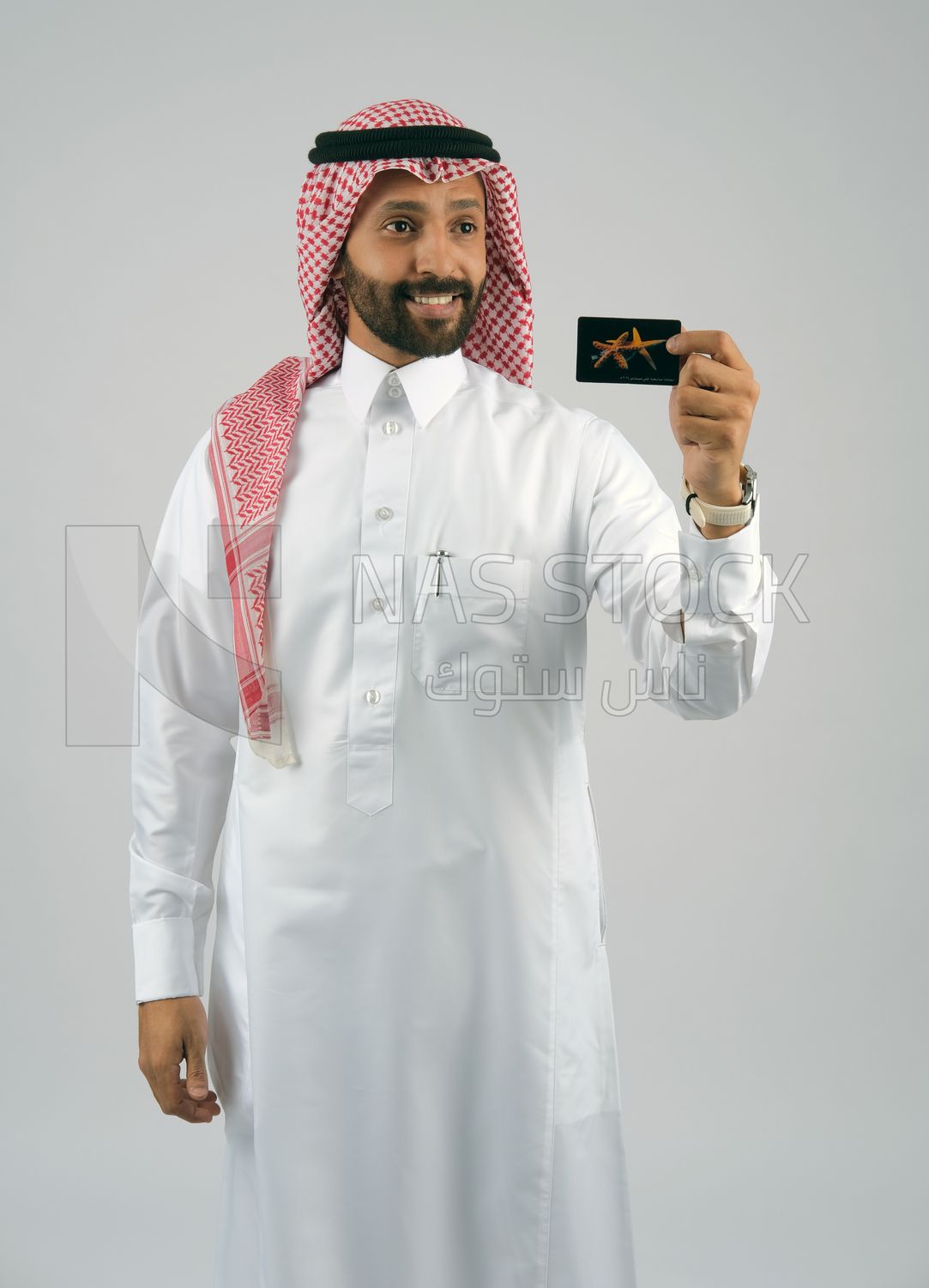 Gulf man holding a card
