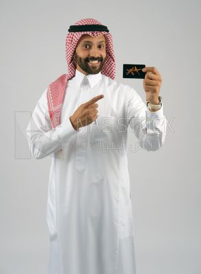 Gulf man holding a card