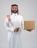 Gulf man holding a  cardboard box