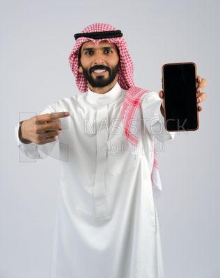 Gulf man holding a Mobile phone