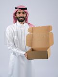 Gulf man holding a Cardboard box