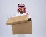 Gulf man holding a Cardboard box