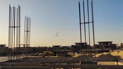 Construction site with a group of concrete buildings and buildings under construction