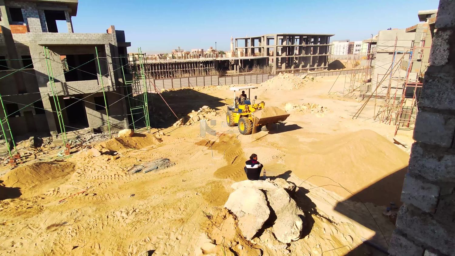 Concrete buildings and constructions inside a construction site
