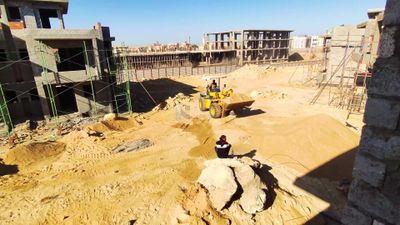 Concrete buildings and constructions inside a construction site