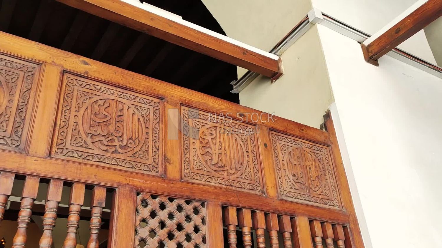 Islamic inscriptions and arts on a wooden wall inside Al-Azhar Mosque