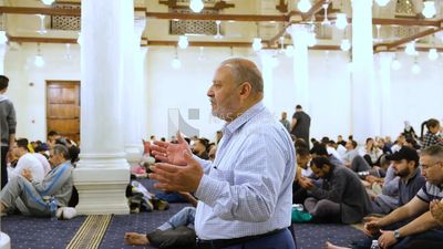 Man in the mosque, praying to God, praying on the prayer rug, performing the obligatory prayer in the mosque, worship and draw close to God