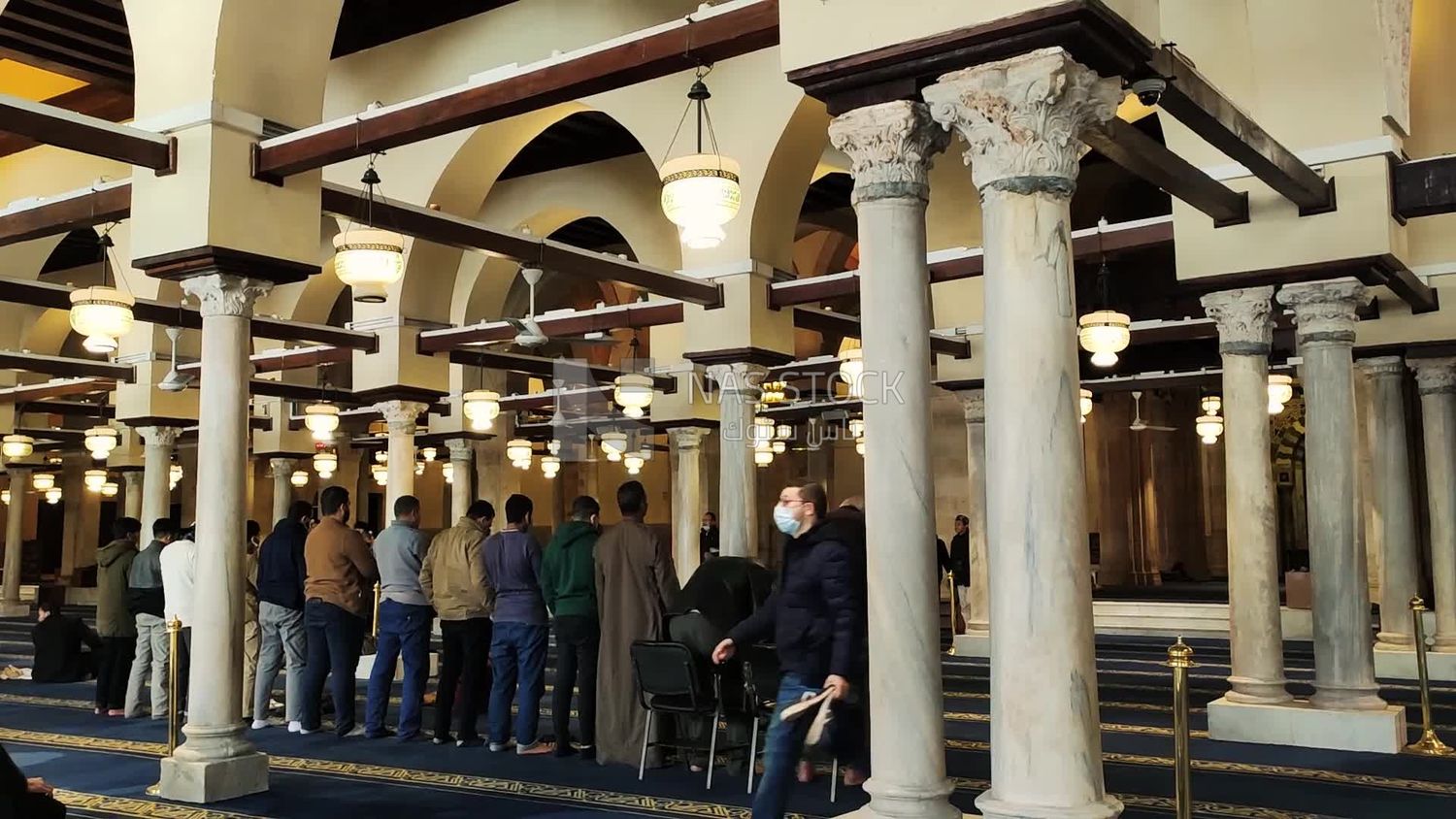 Muslims praying inside Al-Azhar Mosque