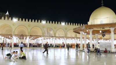 Worshipers praying in a mosque, performing the obligatory prayer in the mosque, worship and draw close to God