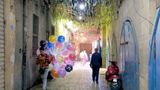 Boy selling luminous balloons in the street, Sayeda Zainab, Ramadan Kareem