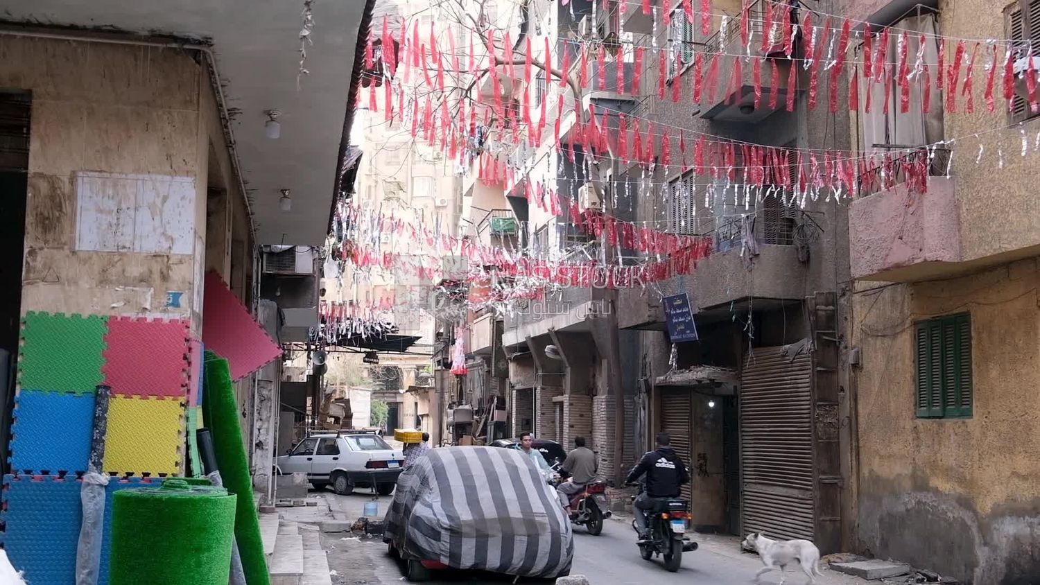 People walking in the street, Ramadan Kareem