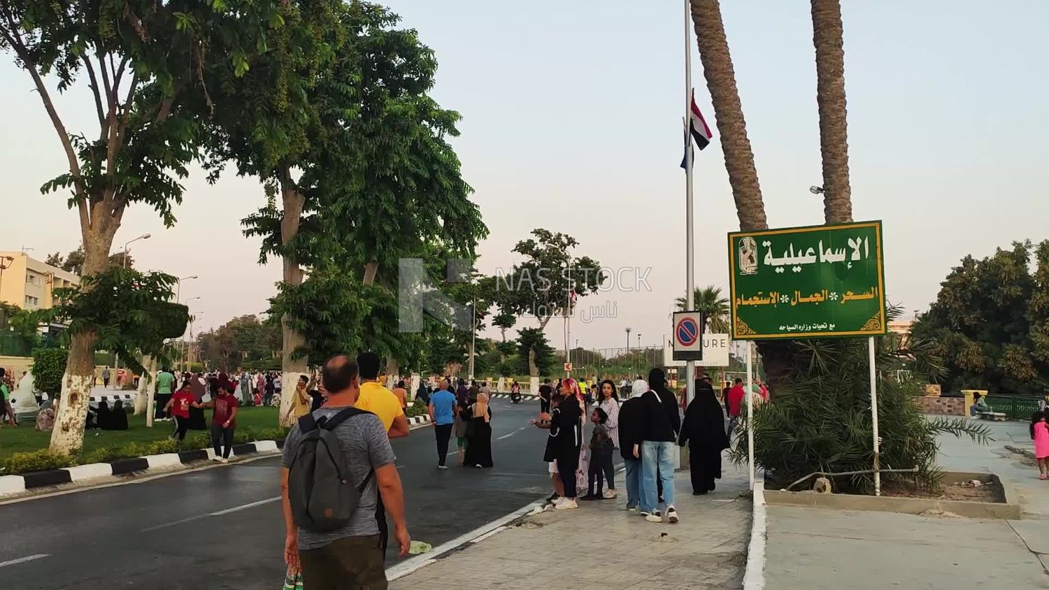 Street crowded with people in Egypt, people walking in the street at Ismailia