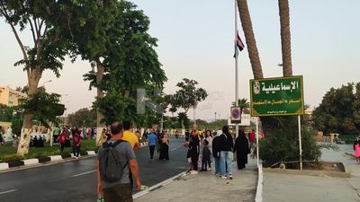 Street crowded with people in Egypt, people walking in the street at Ismailia