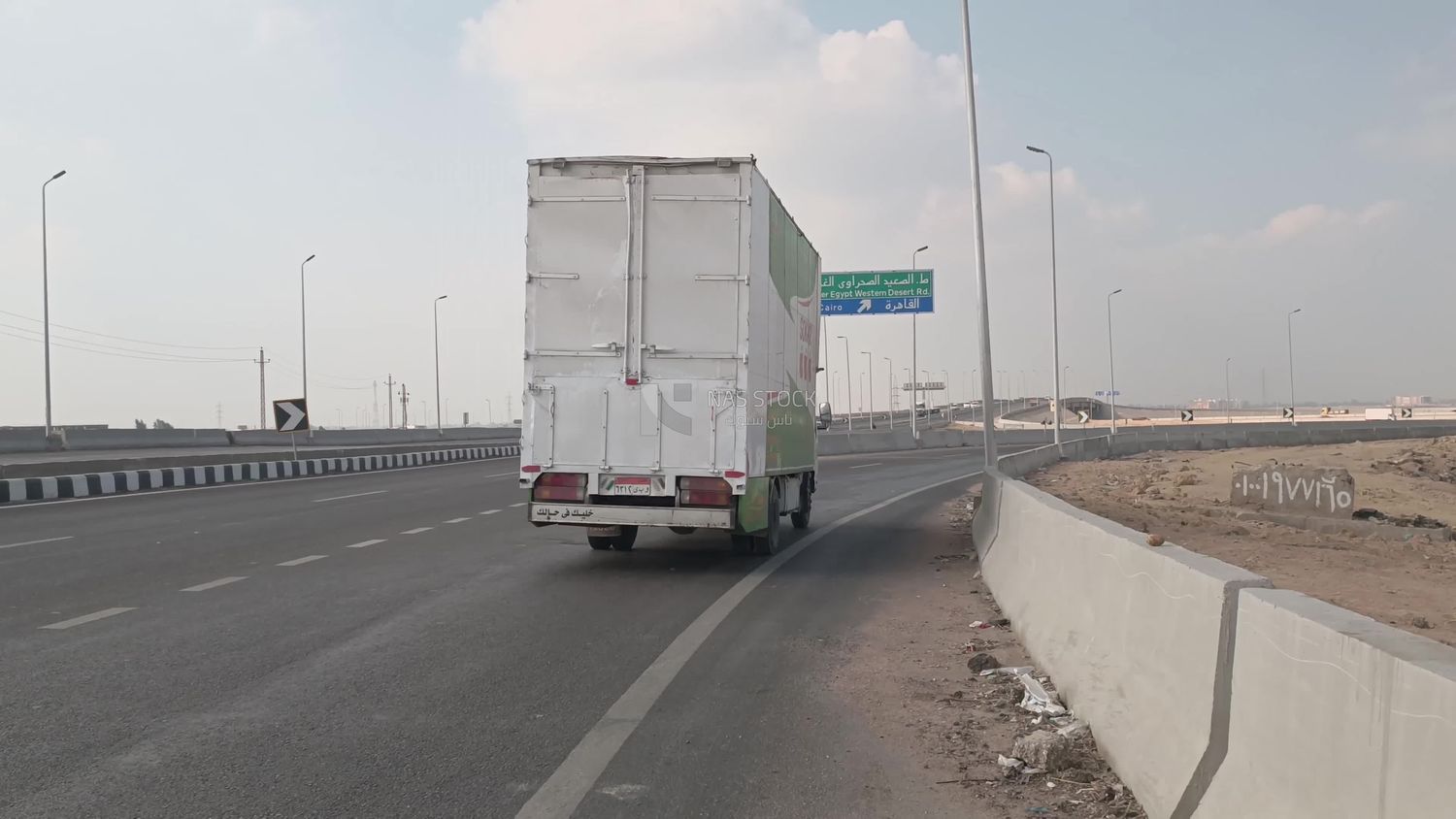 Video showing a crossroads with a sign showing the direction of Assiut Road and the direction of Cairo Road