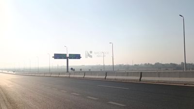 Video showing the desert road with signs guiding travelers to the road