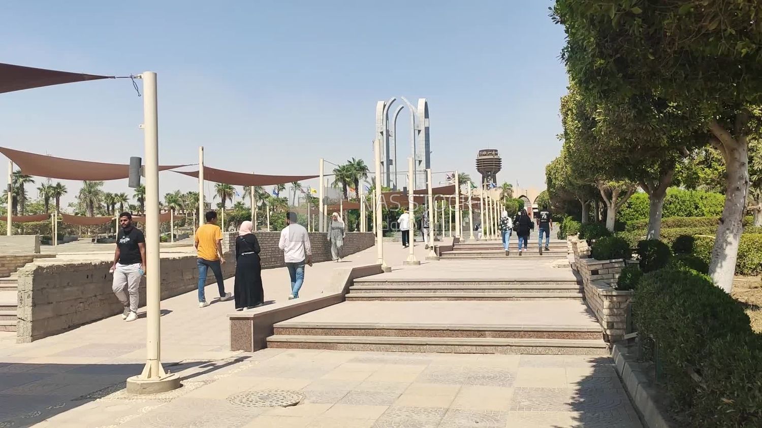 People walking in a garden in Cairo, Egypt